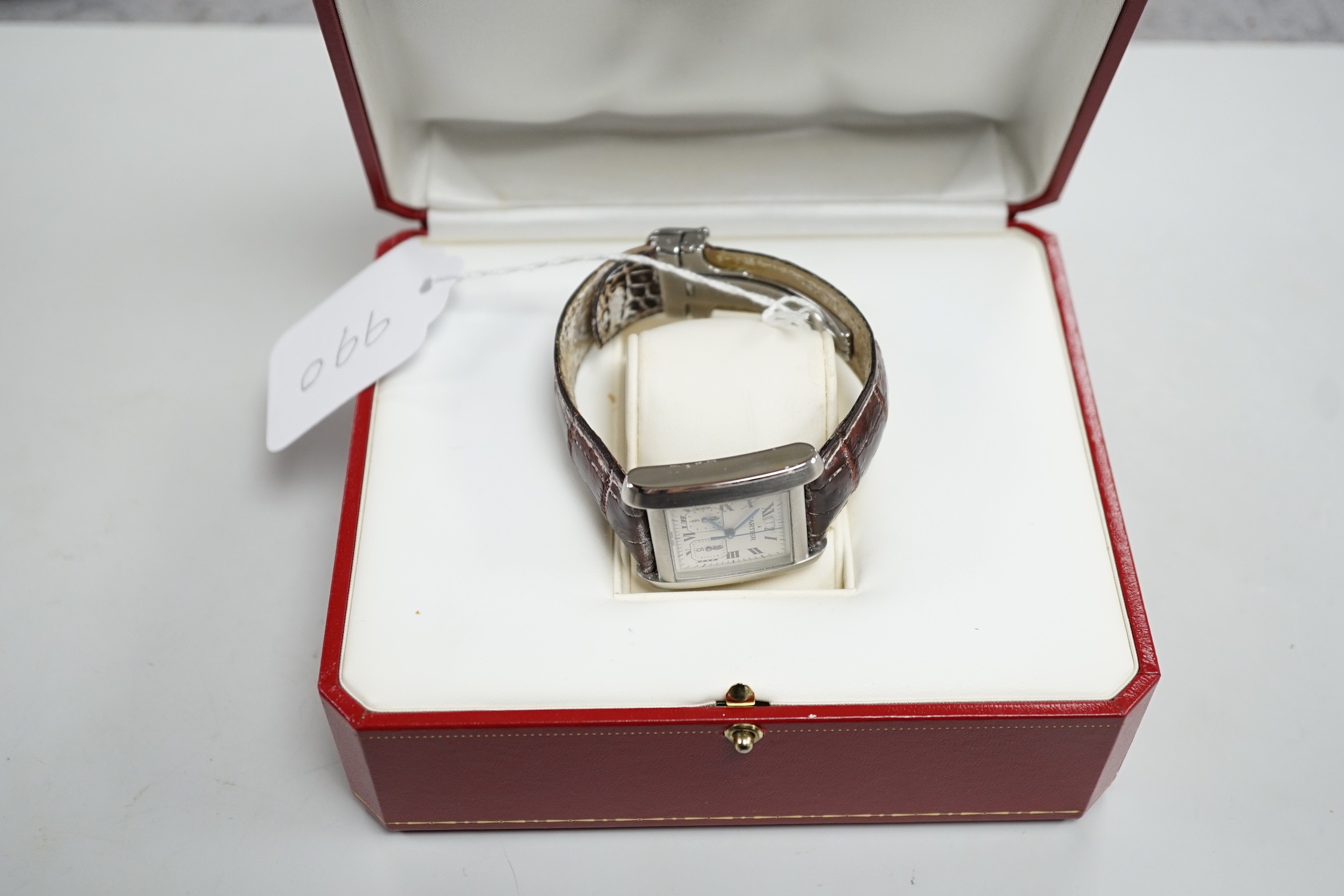 A gentleman's 2006 stainless steel Cartier Tank Francaise quartz wrist watch, with Roman numerals and two subsidiary dials, case diameter 30mm, with original Cartier box and booklets.
